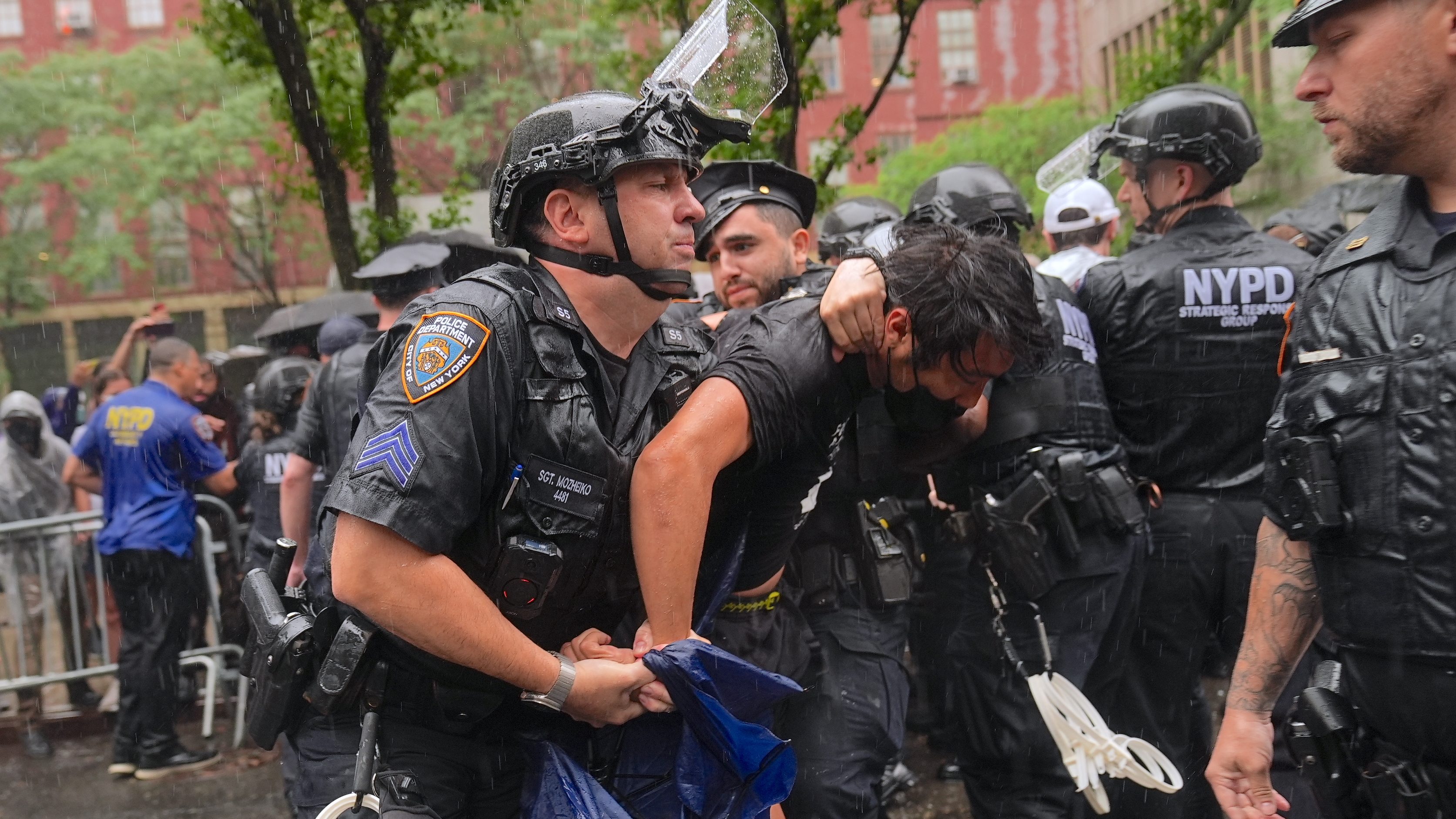 NEW YORK, US - JUNE 7: Police in New York intervened forcefully in a protest held in support of migrants detained by US Immigration and Customs Enforcement (ICE) on Saturday, June 7, detaining several demonstrators and using pepper spray to disperse the crowd. Protesters had gathered in the city center to denounce immigration policies and ongoing detentions. Police moved in when crowds refused to disperse, deploying pepper spray during clashes with demonstrators. Several protesters were injured during the confrontation and were transported to nearby hospitals by ambulance. Protesters called for the protection of migrant rights and an end to ICE detentions. (Photo by Selcuk Acar/Anadolu via Getty Images)